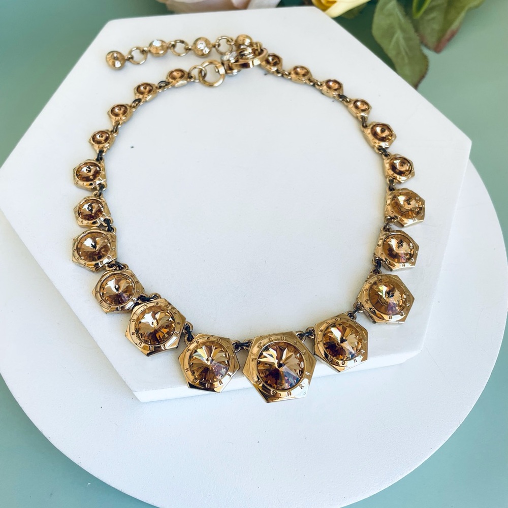 Henri Bendel brown crystal stone rivet logo  necklace